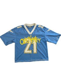 a blue jersey with the number 21 on it