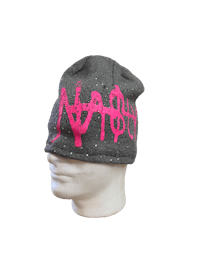 a mannequin head with a pink beanie on it