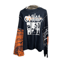 a long - sleeved t - shirt with an orange and black design